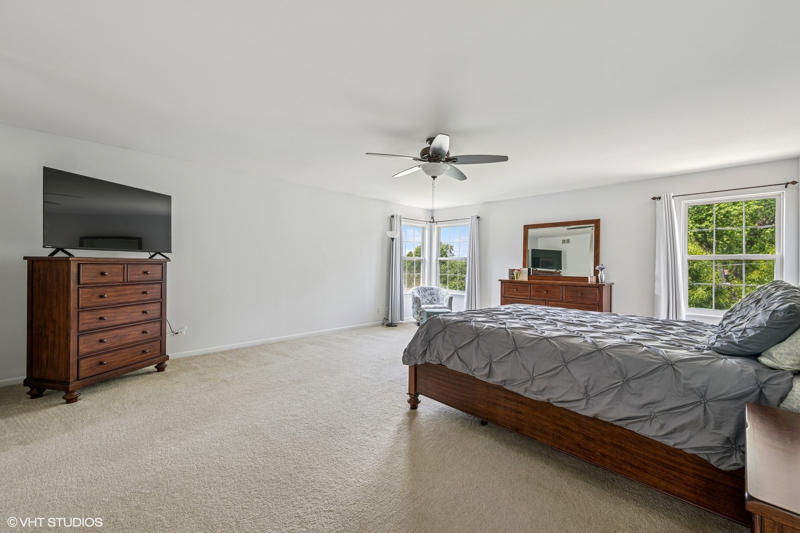 350 Sterling Circle Cary, IL 60013 - Photo 13 of 31 a bedroom with a bed and a television in it