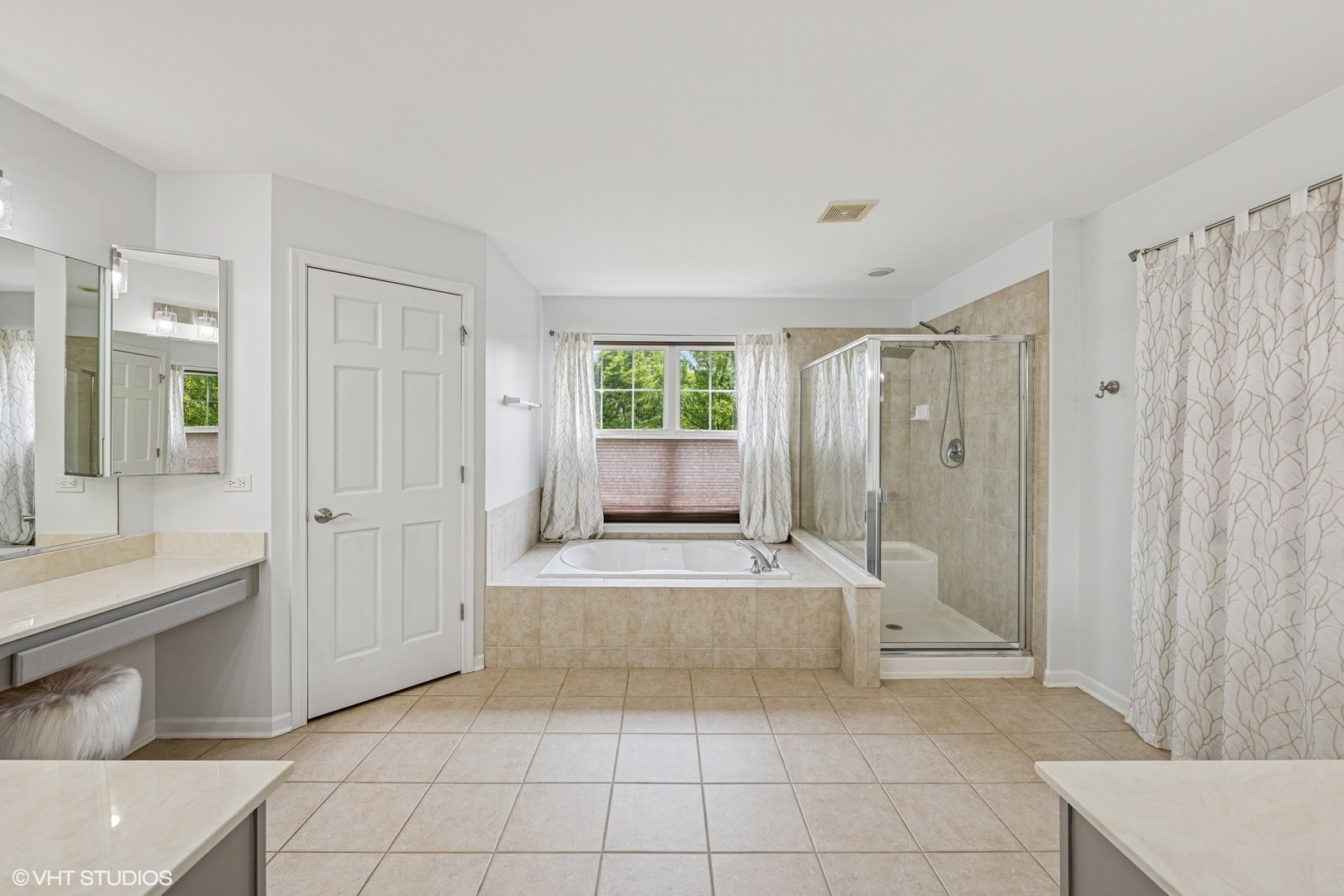 350 Sterling Circle Cary, IL 60013 - Photo 14 of 31 a spacious bathroom with a shower and a tub