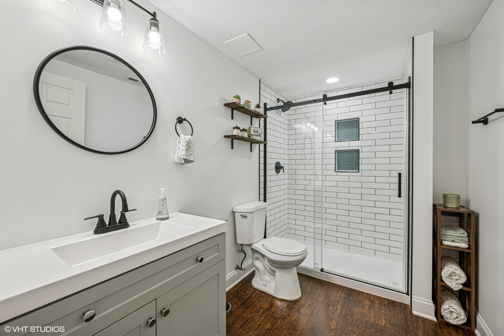 350 Sterling Circle Cary, IL 60013 - Photo 21 of 31 a bathroom with a toilet a sink and mirror