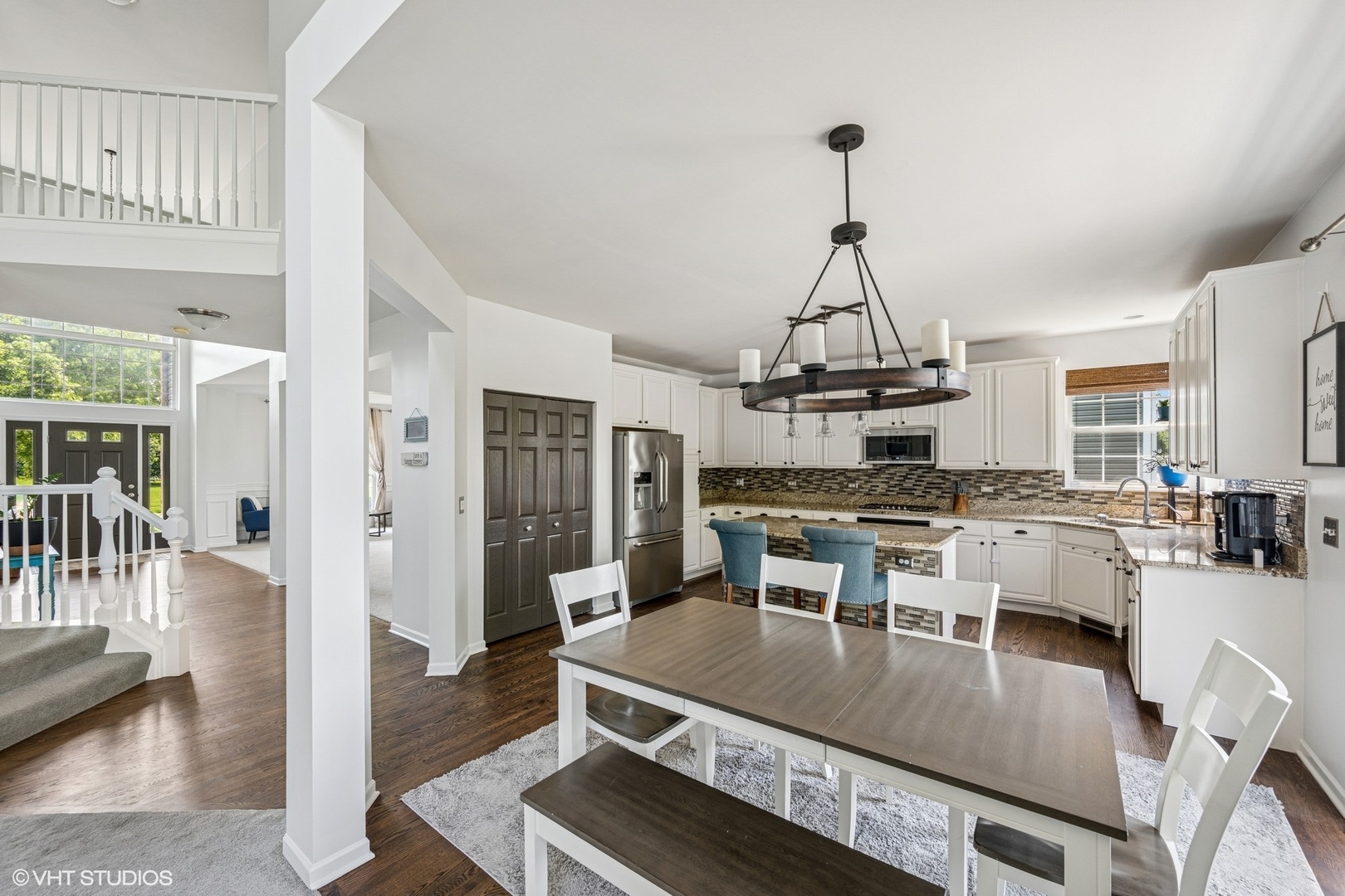 350 Sterling Circle Cary, IL 60013 - Photo 8 of 31 a kitchen with stainless steel appliances granite countertop a stove refrigerator and cabinets