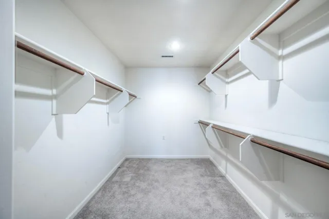 a view of a room with racks on the wall