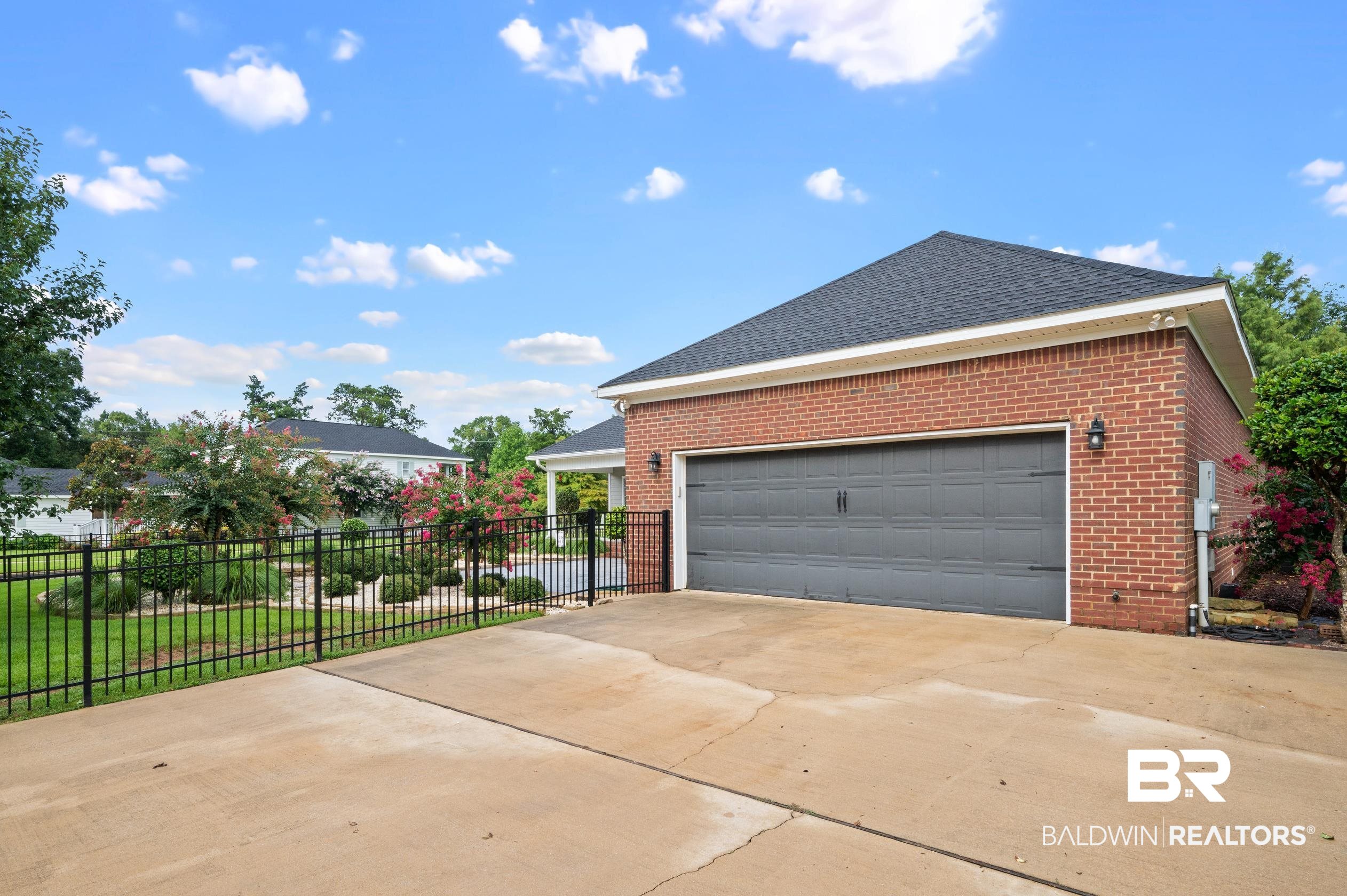 29614 St George Street Daphne, AL 36526 - Photo 39 of 42 View of home's exterior with a yard