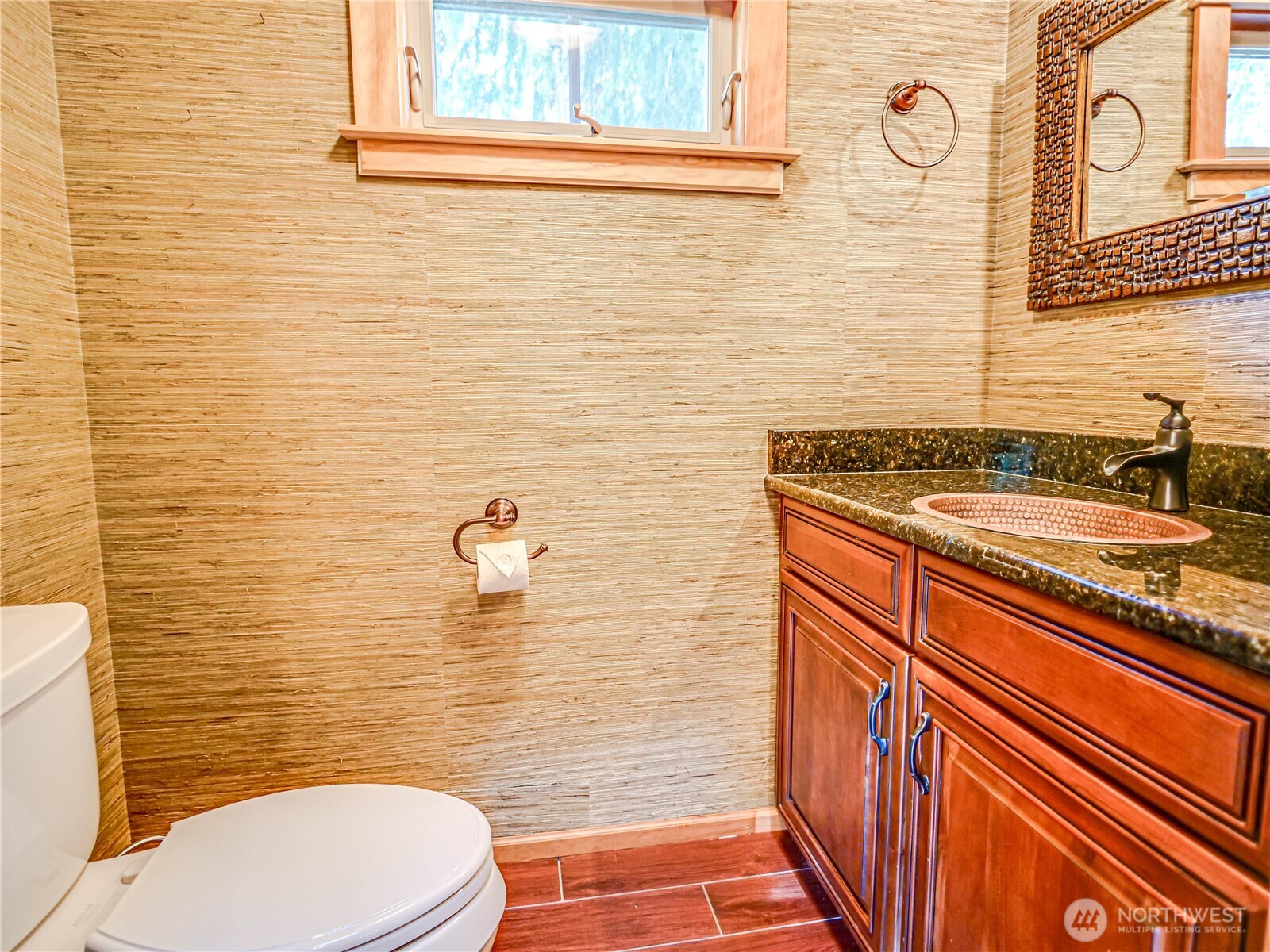 18612 51st Avenue Southeast Bothell, WA 98012 - Photo 7 of 20 a bathroom with a sink a toilet and shower