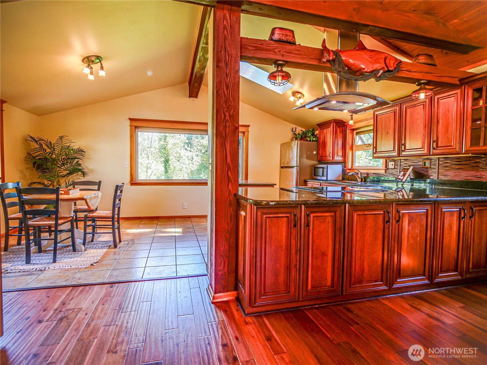 18612 51st Avenue Southeast Bothell, WA 98012 - Photo 8 of 20 a view of a living room with furniture window and wooden floor