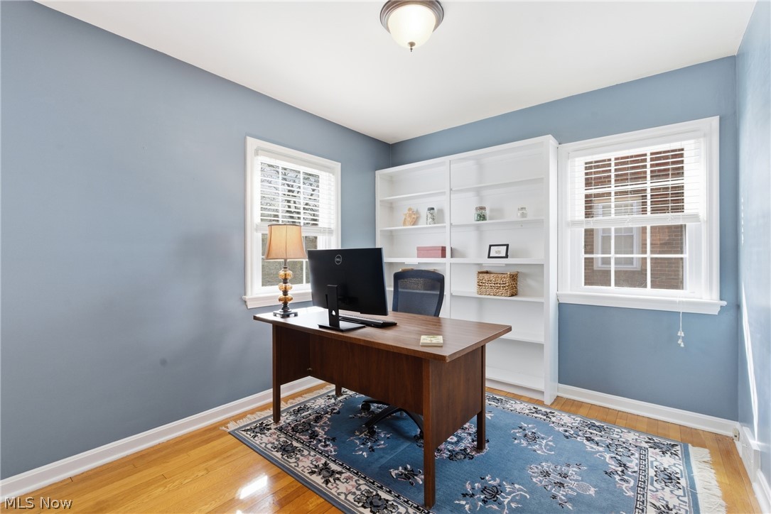 2552 Channing Road Cleveland, OH 44118 - Photo 16 of 33 Third bedroom featuring hardwood floors and built-in shelving.