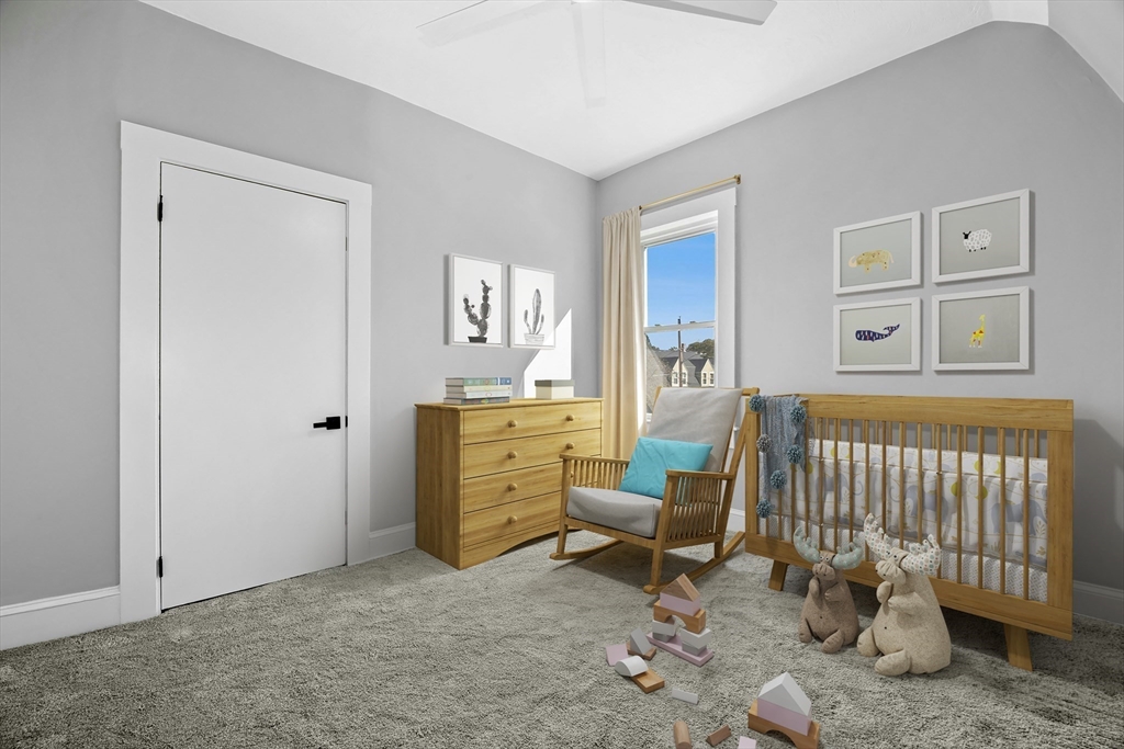 15 Arthur Street, Unit 15 Maynard, MA 01754 - Photo 15 of 21 a living room with furniture and a window