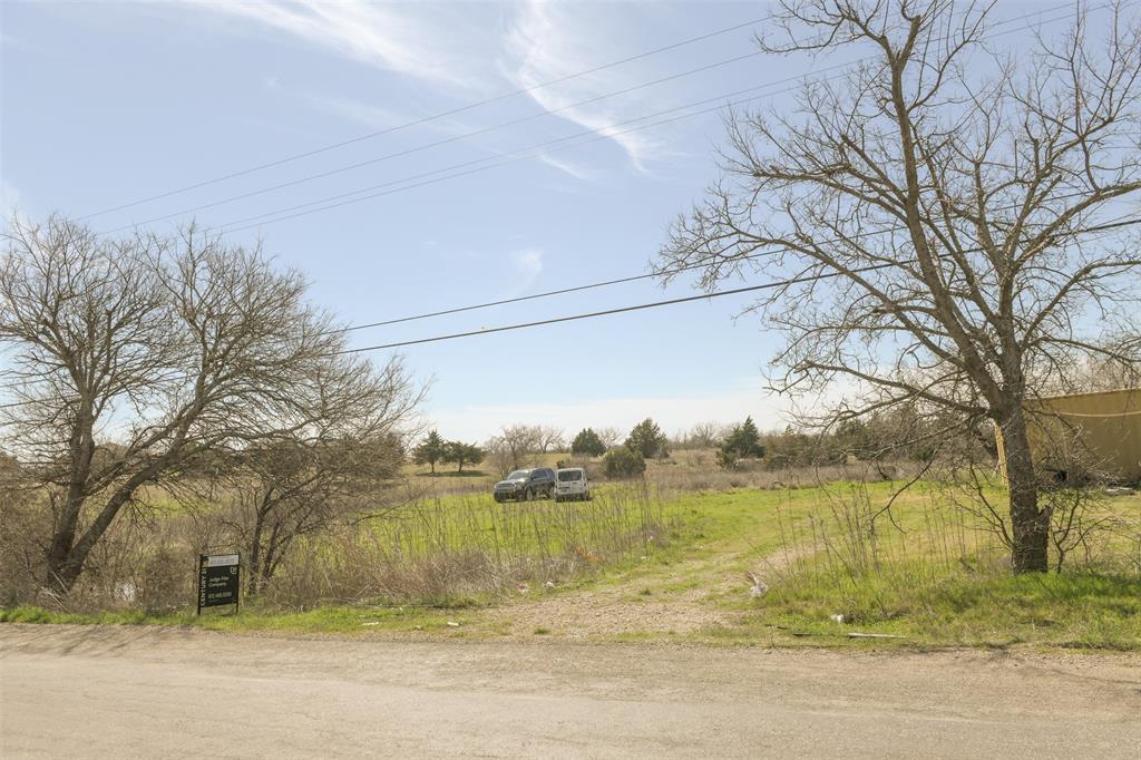 4590 Old Fort Worth Road Midlothian, TX 76065 - Photo 20 of 20 a view of lake with a yard