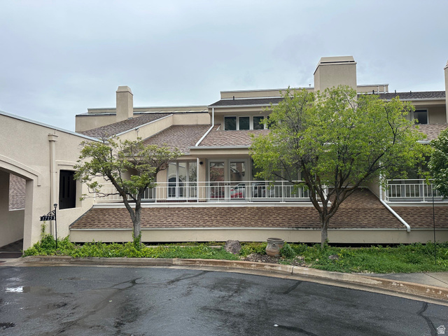 1715 Darling Street, Unit 3 Ogden, UT 84403 - Photo 1 of 26 Multi-level exterior featuring light-toned stucco and prominent chimneys