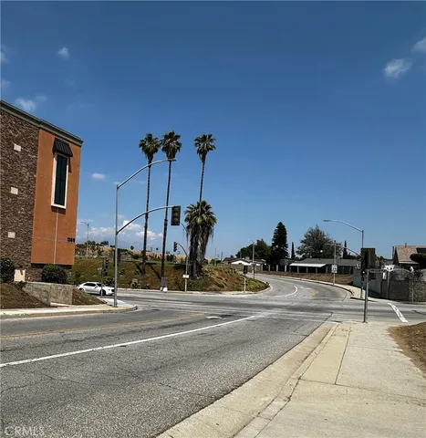 a view of a building with a street