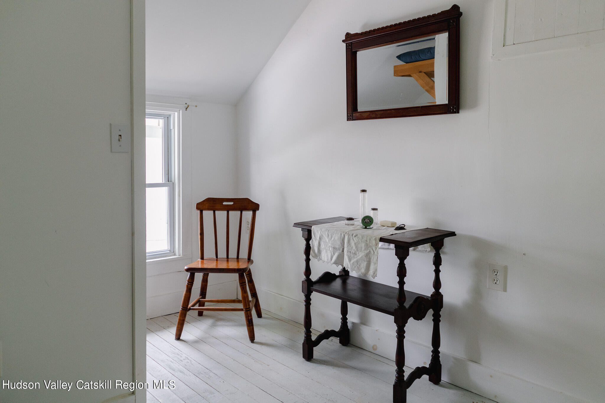 35 County Rte 351 Medusa, NY 12120 - Photo 19 of 32 a view of a workspace with furniture and a potted plant