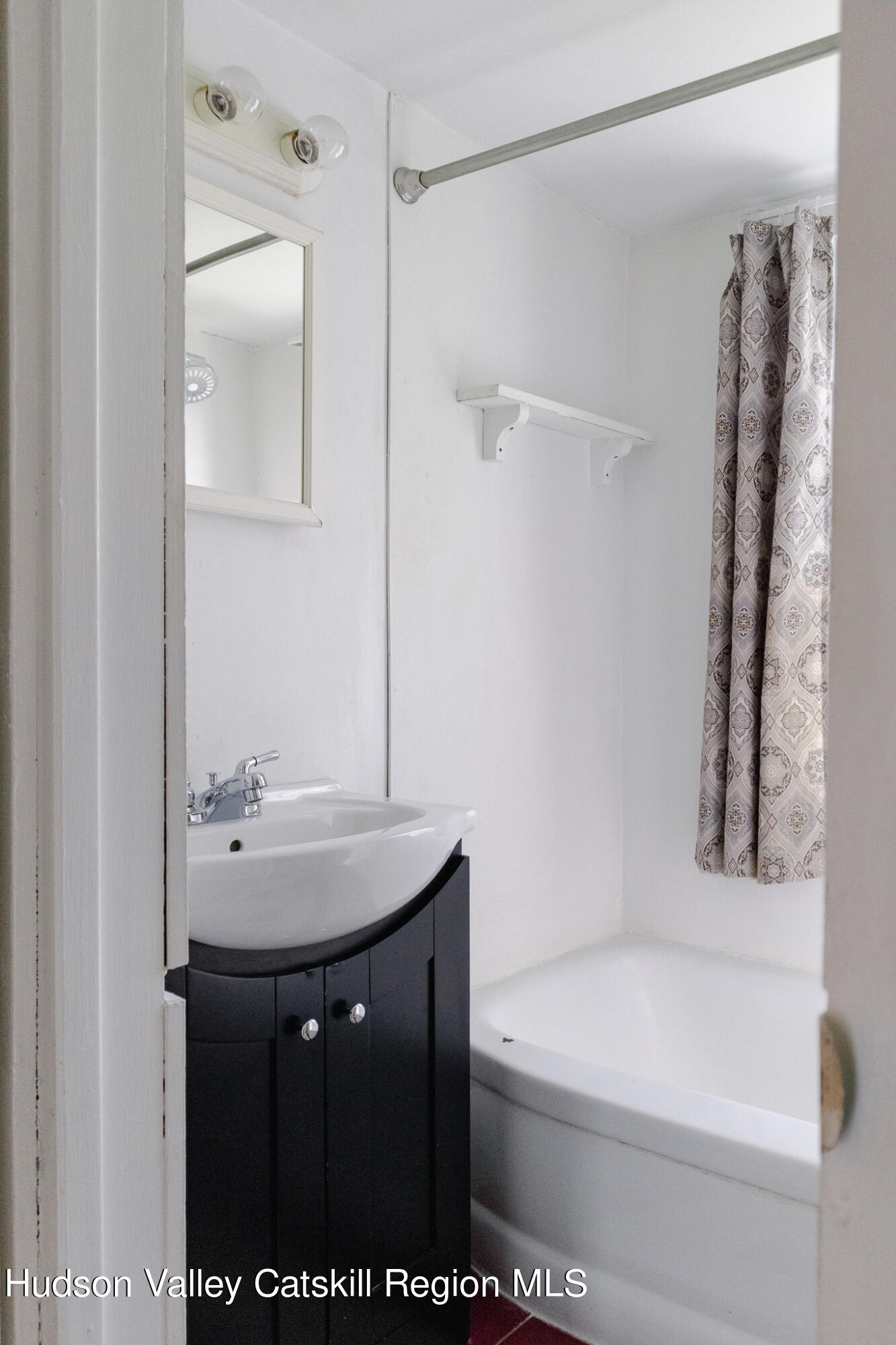 35 County Rte 351 Medusa, NY 12120 - Photo 20 of 32 a bathroom with a sink a toilet and shower