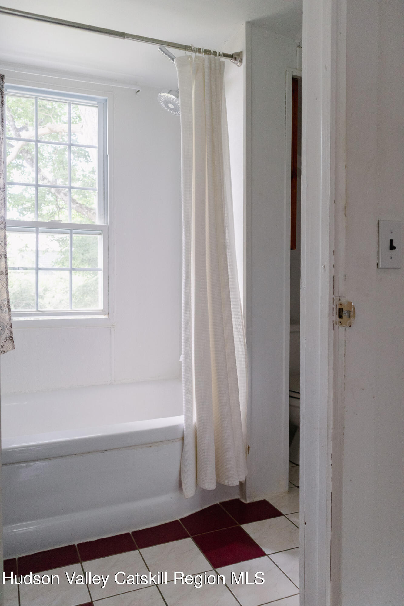 35 County Rte 351 Medusa, NY 12120 - Photo 21 of 32 a bathroom with a bathtub and a shower