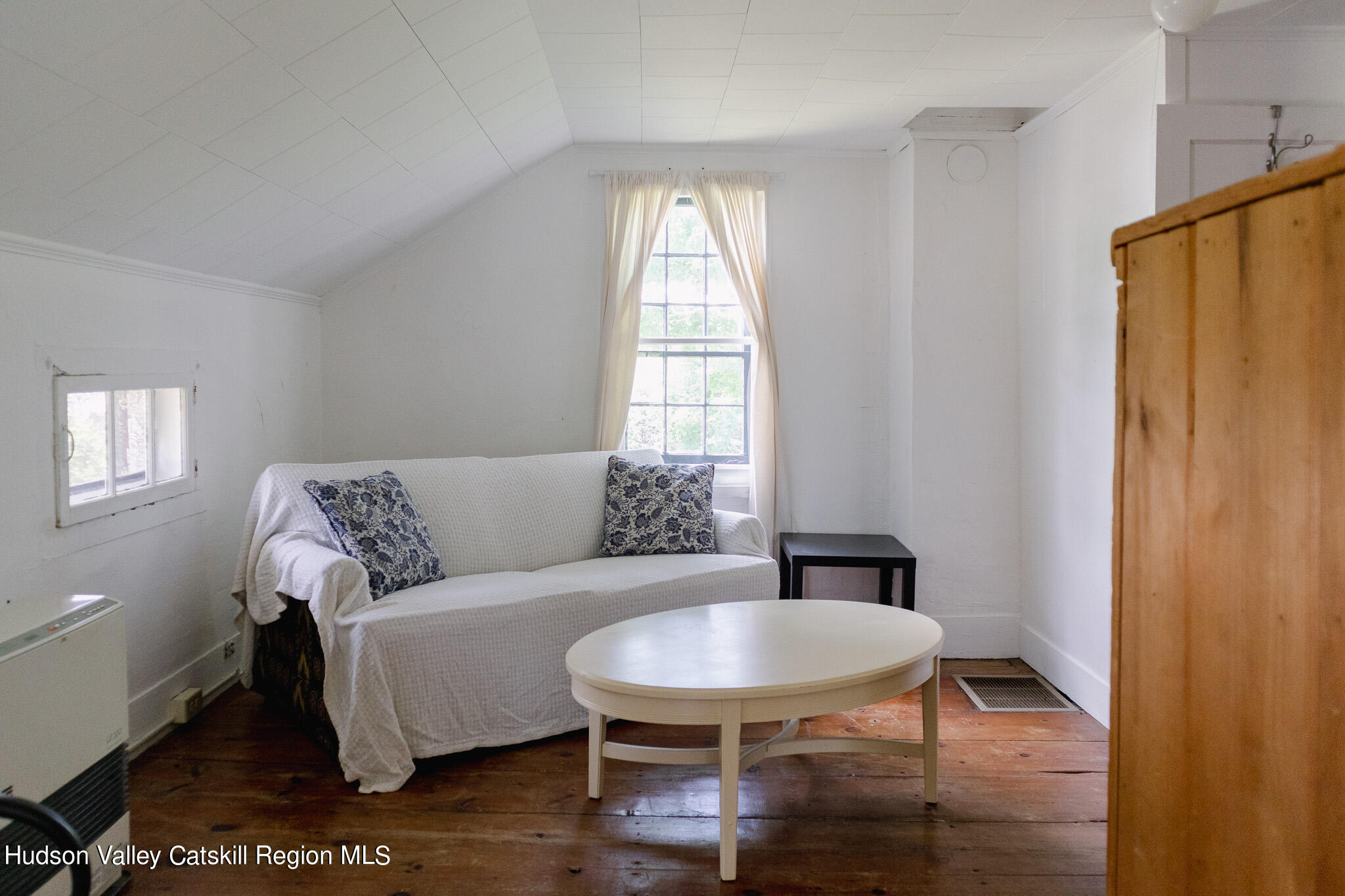 35 County Rte 351 Medusa, NY 12120 - Photo 22 of 32 a living room with furniture a window and wooden floor