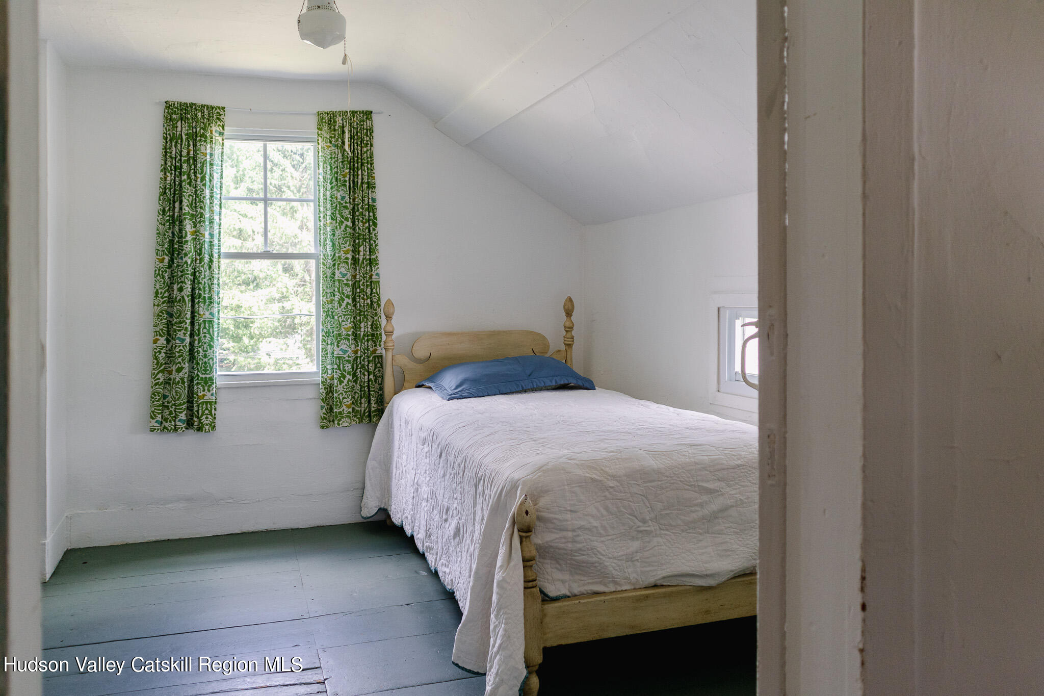 35 County Rte 351 Medusa, NY 12120 - Photo 24 of 32 a bedroom with a bed and a window