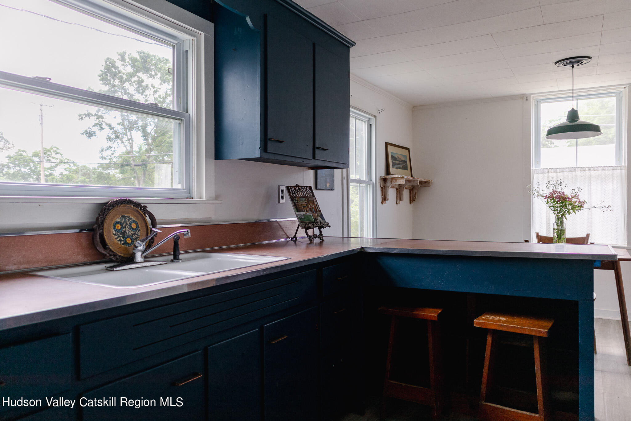 35 County Rte 351 Medusa, NY 12120 - Photo 6 of 32 a kitchen with a sink and wooden floor