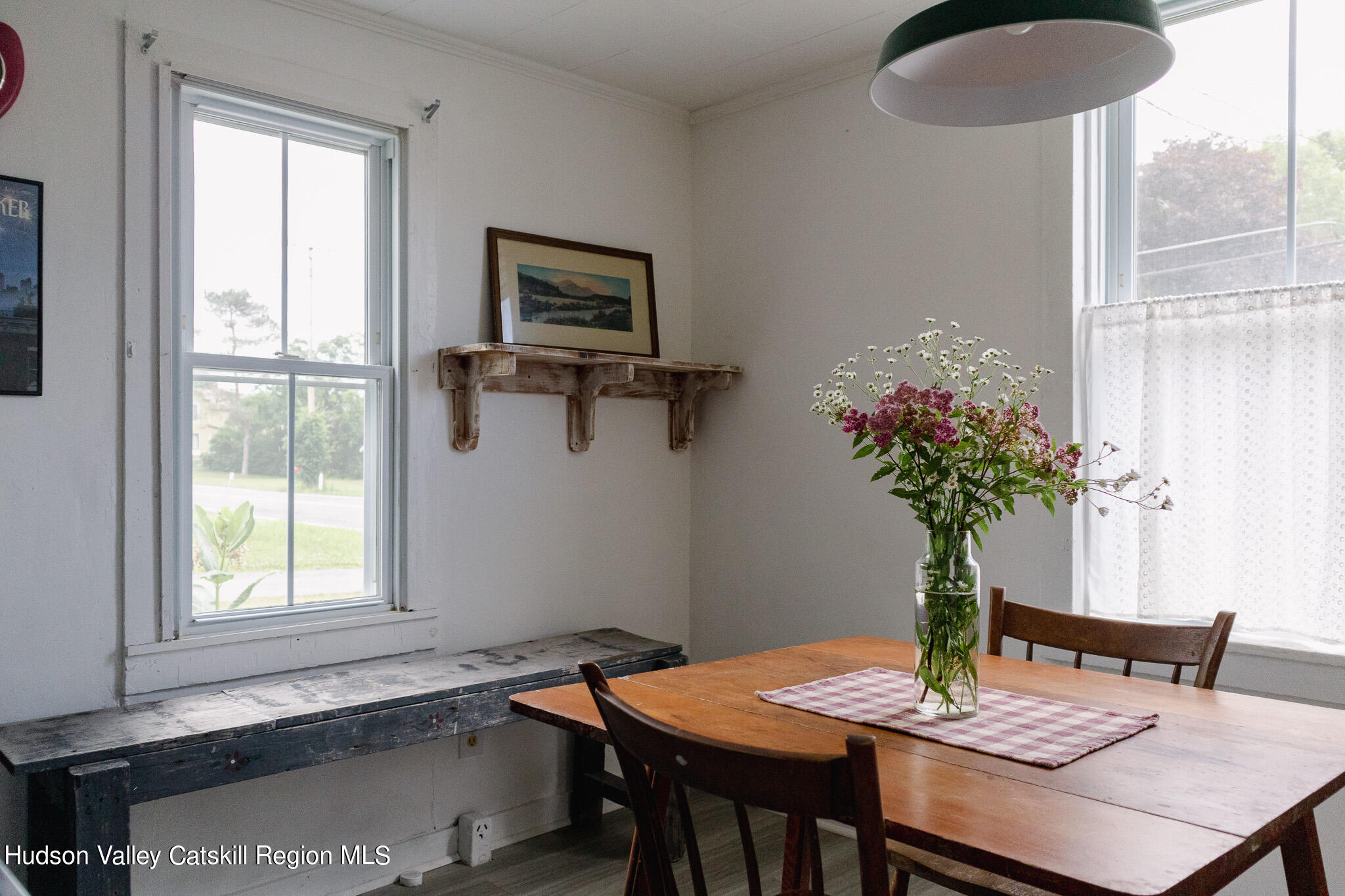 35 County Rte 351 Medusa, NY 12120 - Photo 9 of 32 a view of a dining room with furniture window and wooden floor