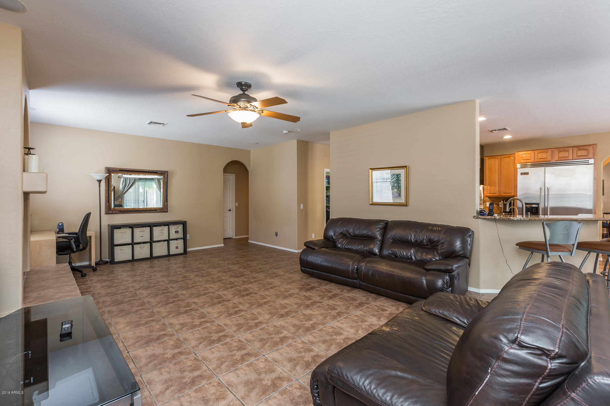 3744 East Del Rio Street Gilbert, AZ 85295 - Photo 13 of 32 a living room with furniture and a large window
