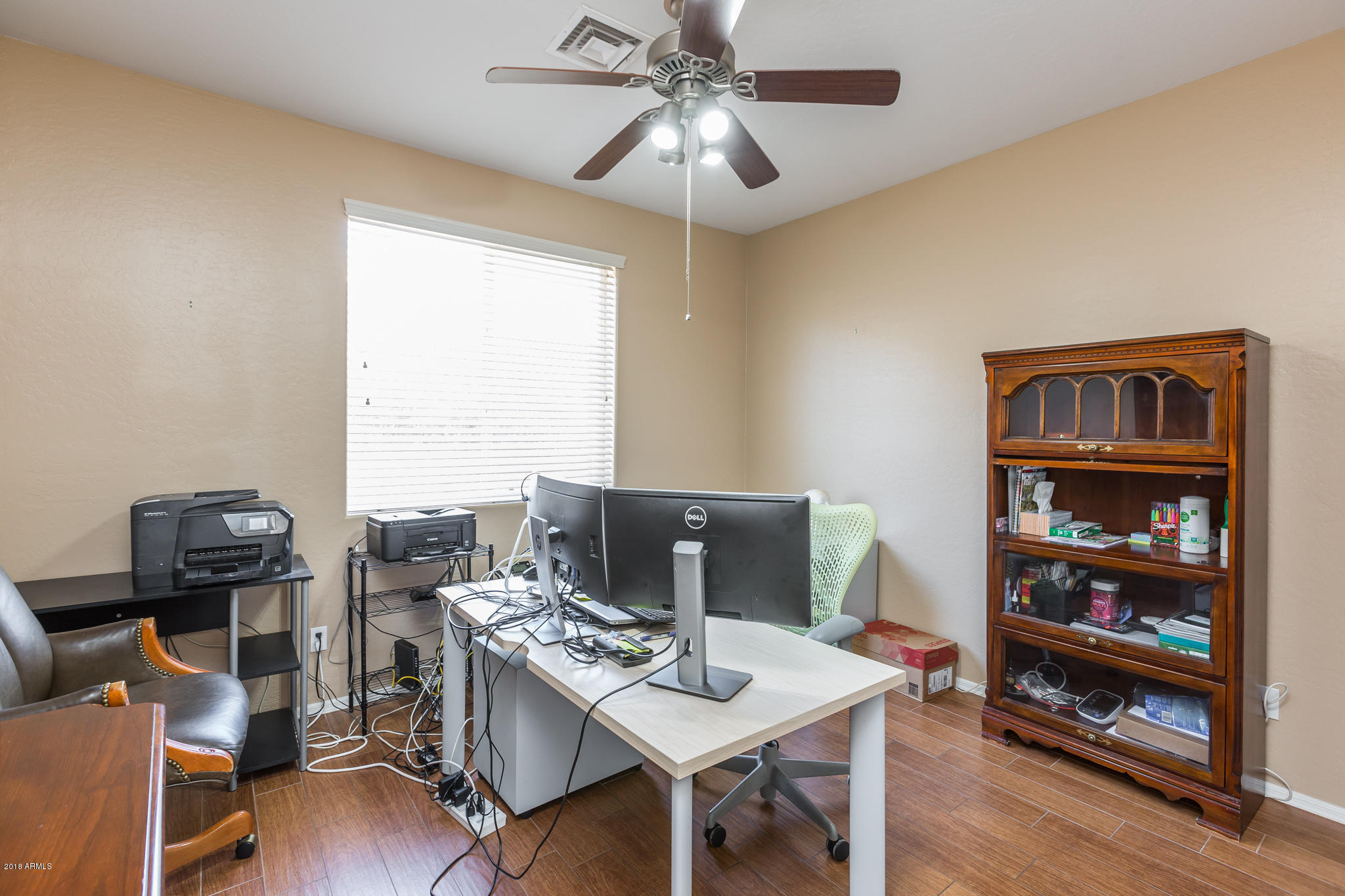 3744 East Del Rio Street Gilbert, AZ 85295 - Photo 18 of 32 a view of a workspace with furniture and a window