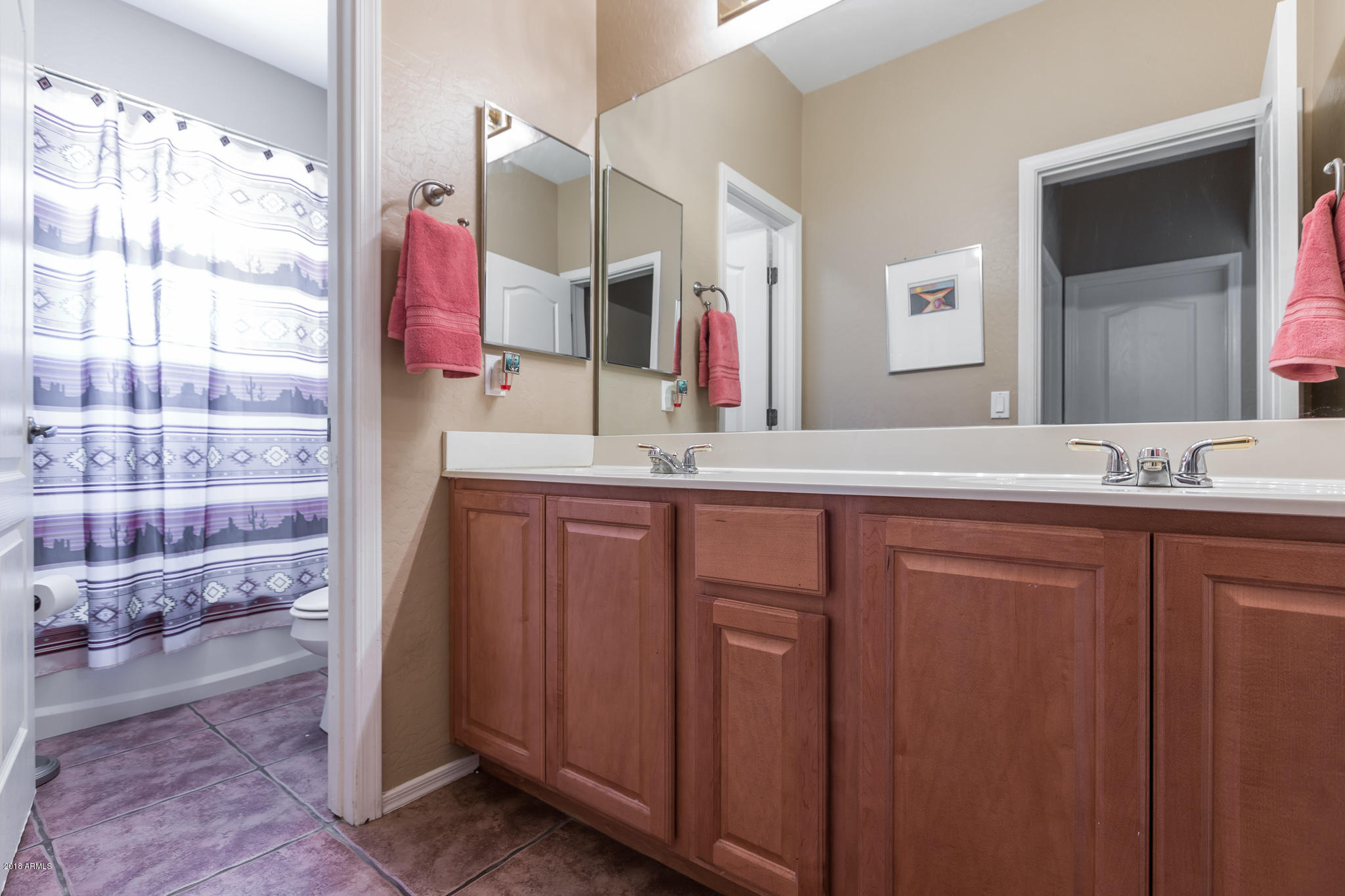 3744 East Del Rio Street Gilbert, AZ 85295 - Photo 19 of 32 a bathroom with a sink and a mirror