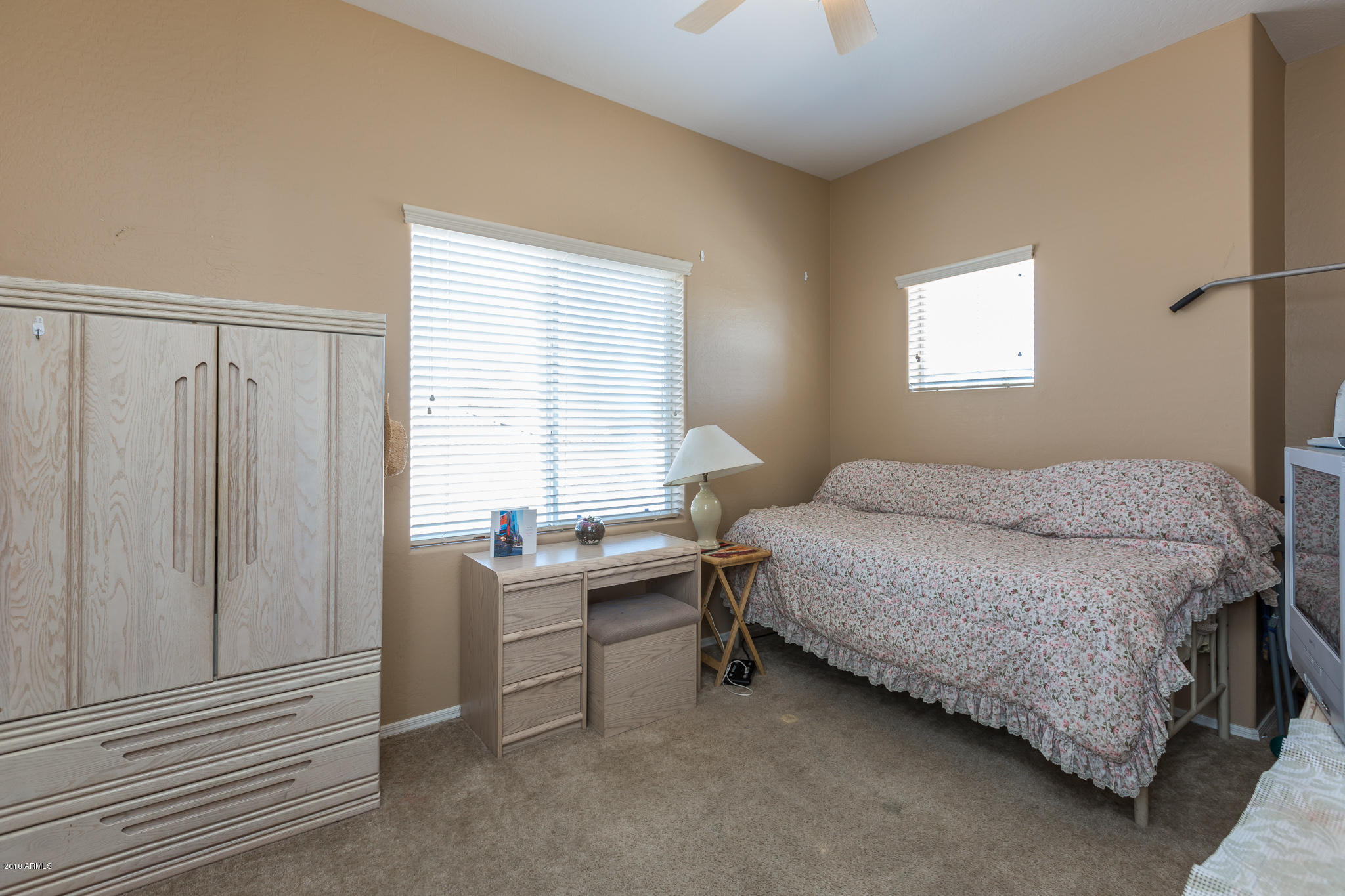 3744 East Del Rio Street Gilbert, AZ 85295 - Photo 22 of 32 a bedroom with a bed and a window
