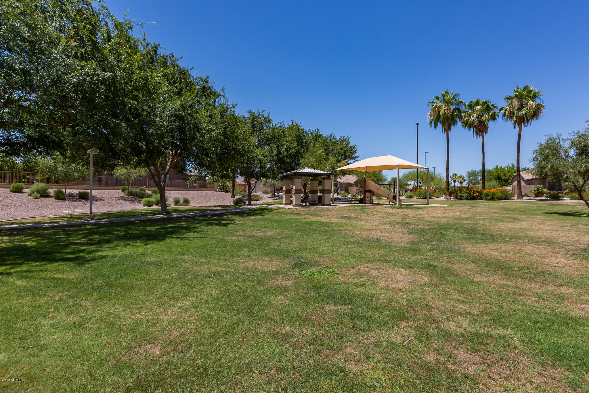 3744 East Del Rio Street Gilbert, AZ 85295 - Photo 31 of 32 a view of a house with a yard