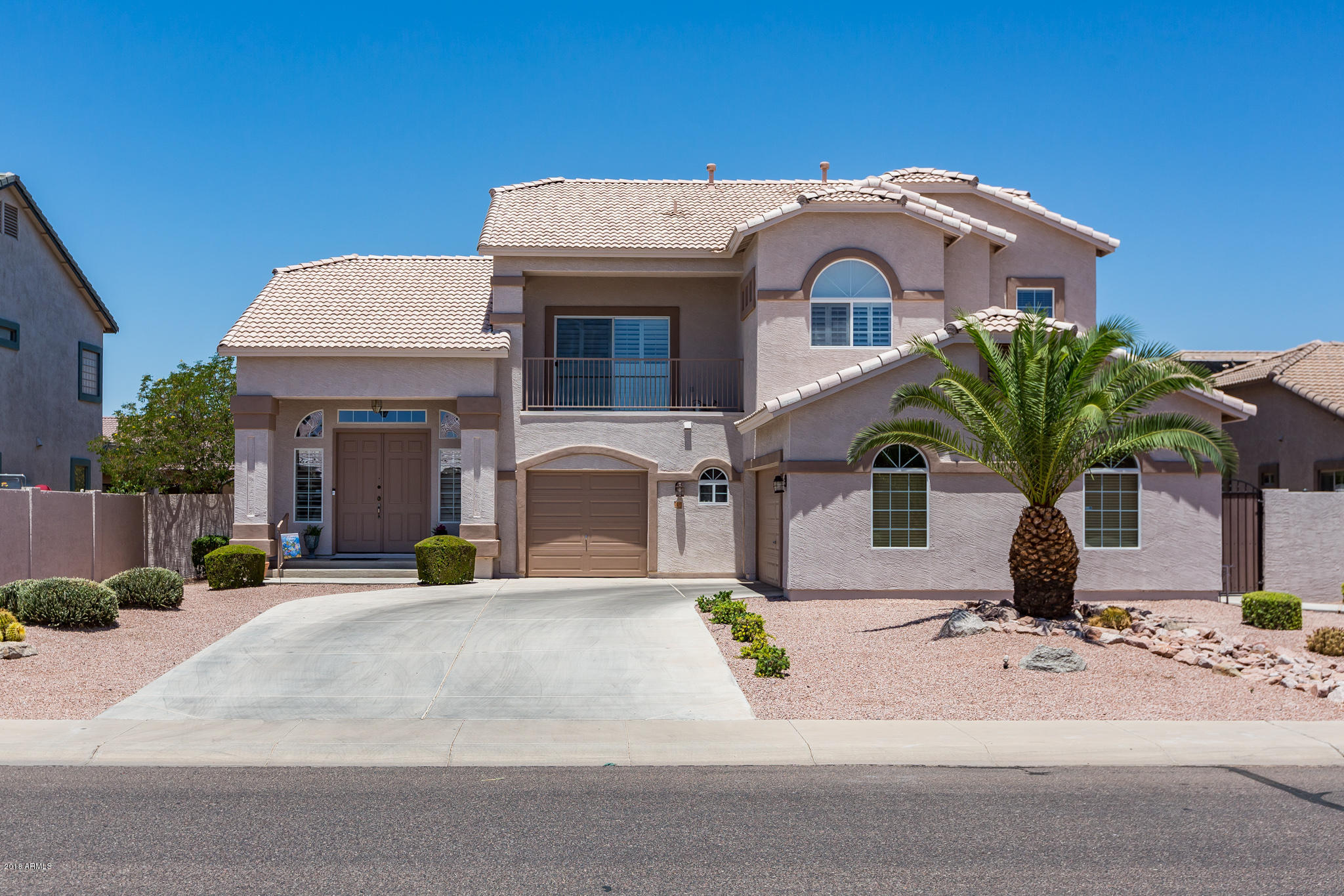 3744 East Del Rio Street Gilbert, AZ 85295 - Photo 32 of 32 a front view of a house with a garden