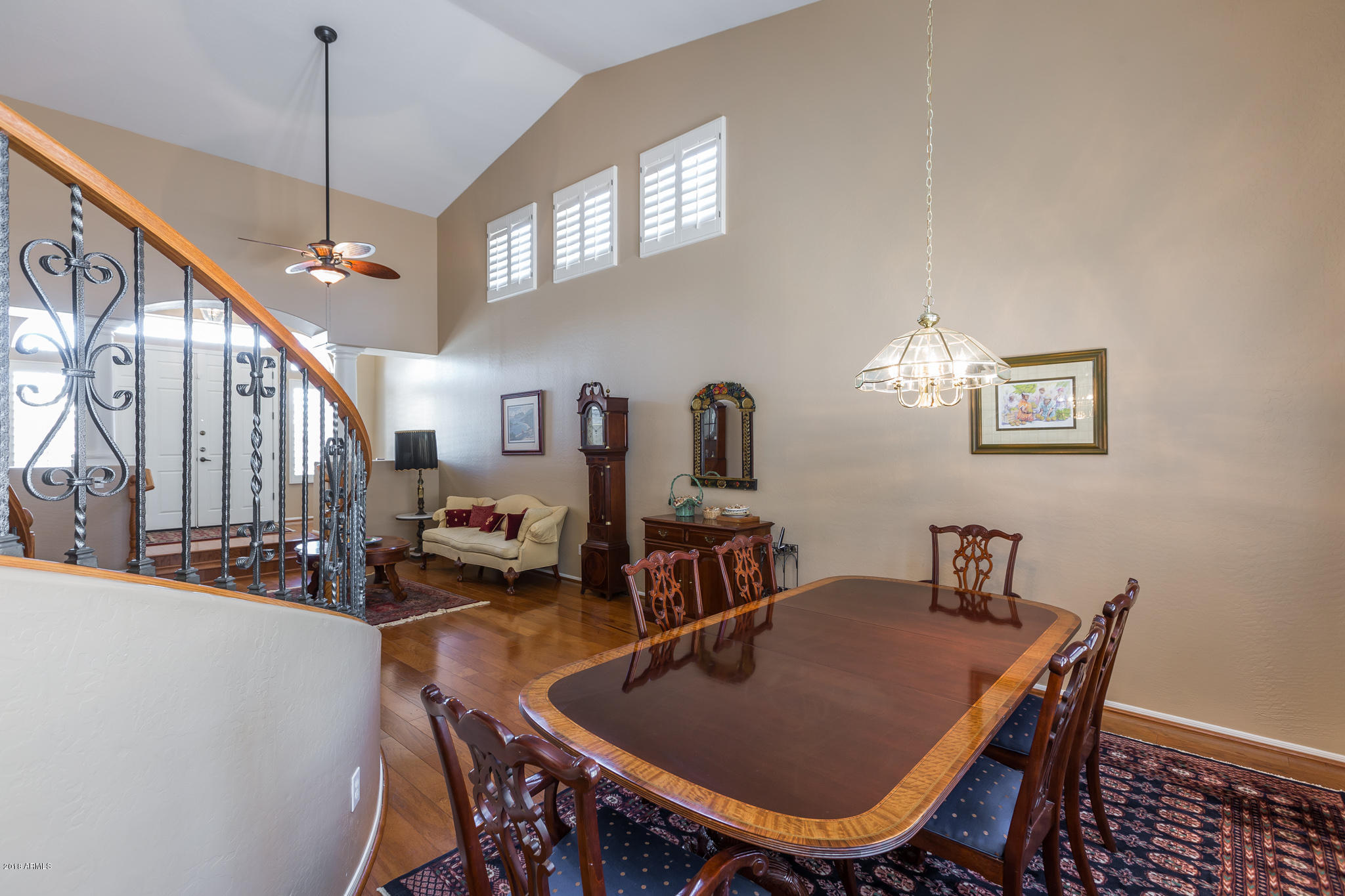 3744 East Del Rio Street Gilbert, AZ 85295 - Photo 6 of 32 a view of a dining room with furniture and a chandelier
