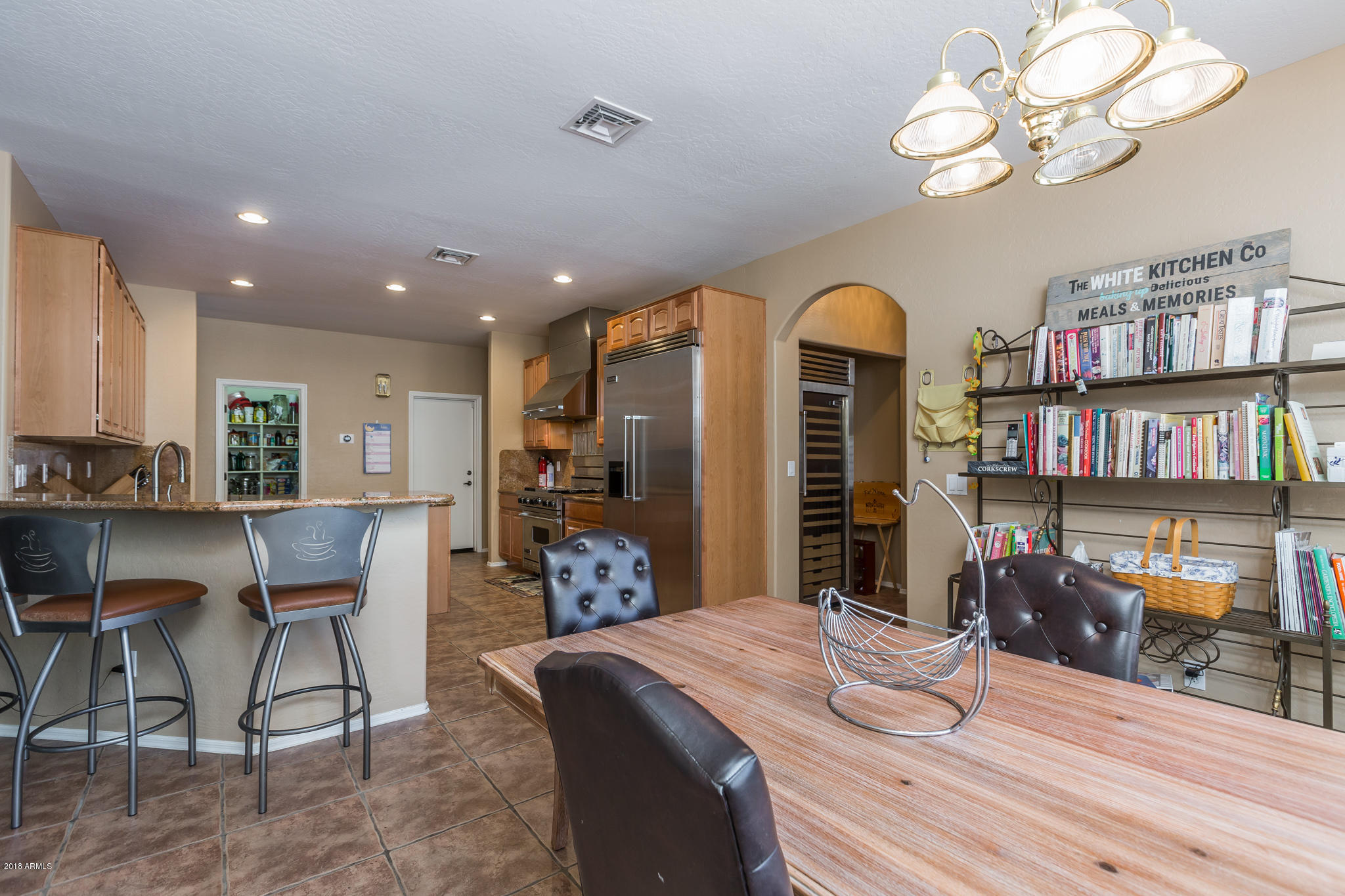 3744 East Del Rio Street Gilbert, AZ 85295 - Photo 8 of 32 a dining room with wooden floor and breakfast area