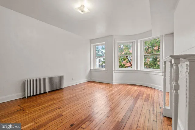 a kitchen with stainless steel appliances granite countertop a sink stove and microwave