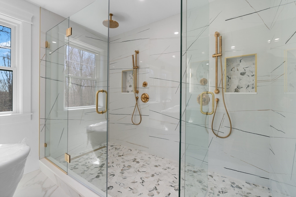 6 Sanders Lane Bolton, MA 01740 - Photo 19 of 36 a bathroom with a shower