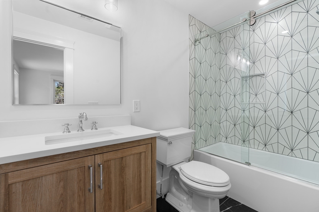 6 Sanders Lane Bolton, MA 01740 - Photo 24 of 36 a bathroom with a sink a toilet and a bathtub