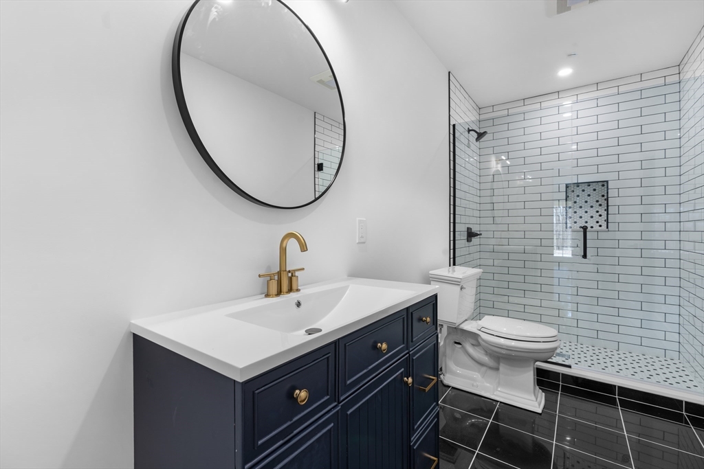 6 Sanders Lane Bolton, MA 01740 - Photo 26 of 36 a bathroom with a sink toilet and a mirror