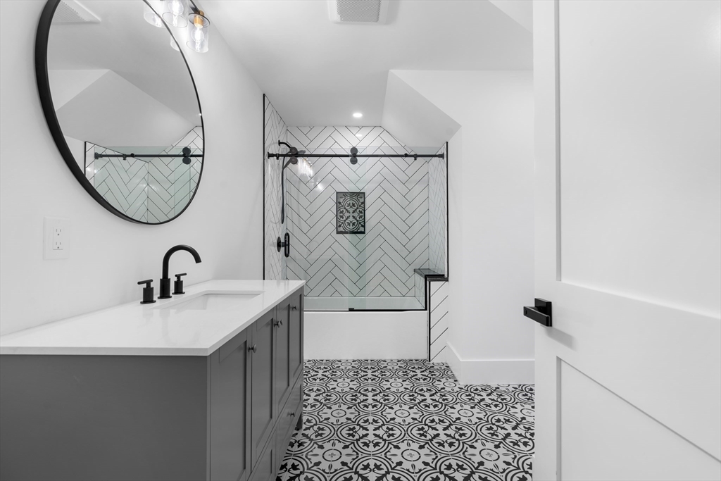 6 Sanders Lane Bolton, MA 01740 - Photo 28 of 36 a bathroom with a sink and a mirror