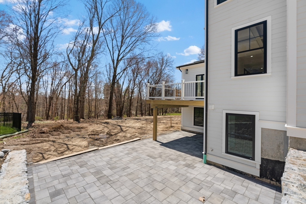 6 Sanders Lane Bolton, MA 01740 - Photo 35 of 36 a view of a house with snow on the wall