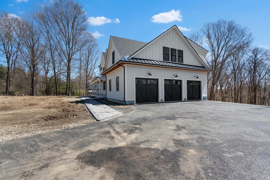 6 Sanders Lane Bolton, MA 01740 - Photo 36 of 36 a view of a house with a yard and large tree