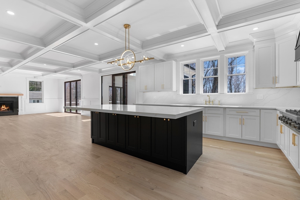 6 Sanders Lane Bolton, MA 01740 - Photo 5 of 36 a kitchen with a sink and cabinets