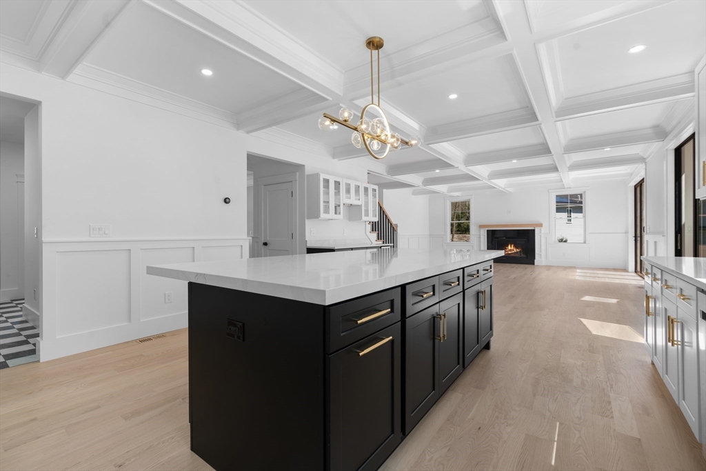 6 Sanders Lane Bolton, MA 01740 - Photo 6 of 36 a kitchen with a counter space cabinets and wooden floor