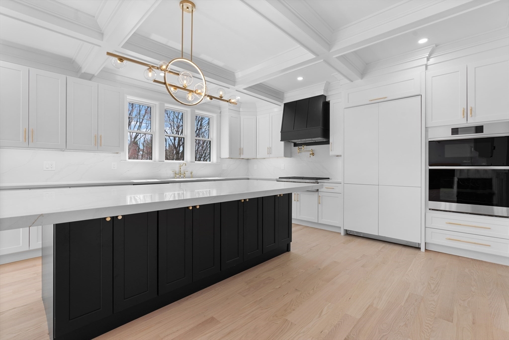 6 Sanders Lane Bolton, MA 01740 - Photo 9 of 36 a kitchen with a sink and a stove top oven