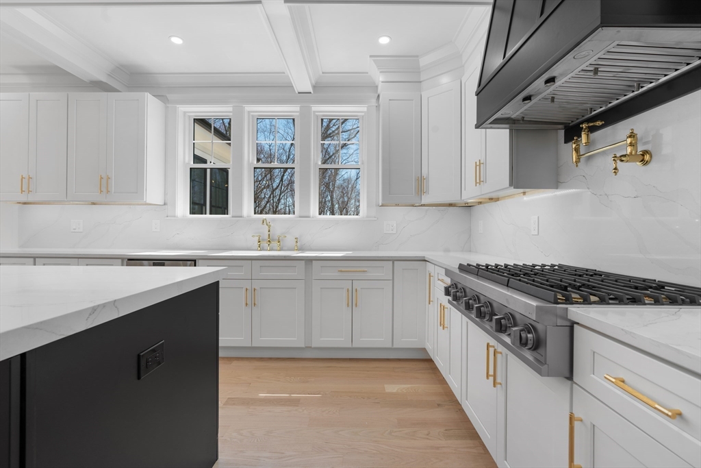6 Sanders Lane Bolton, MA 01740 - Photo 10 of 36 a kitchen with granite countertop a sink stove and cabinets