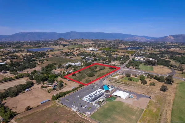 an aerial view of lake and residential houses