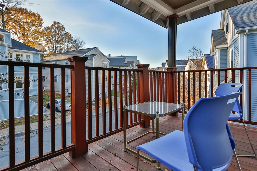 186 Calumet Street, Unit 186 Boston, MA 02120 - Photo 12 of 13 a view of a balcony with furniture