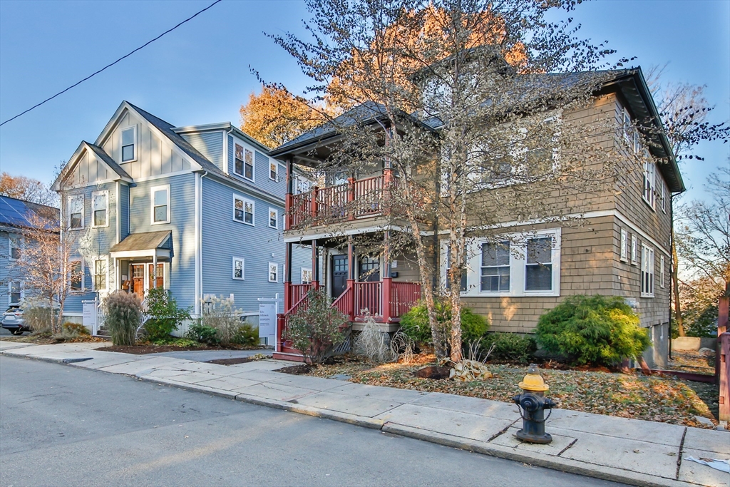 186 Calumet Street, Unit 186 Boston, MA 02120 - Photo 13 of 13 a front view of a building with tree s