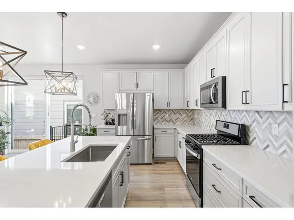 $610,000 | 8453 Gladiola Court, Unit A, Arvada, CO 80005