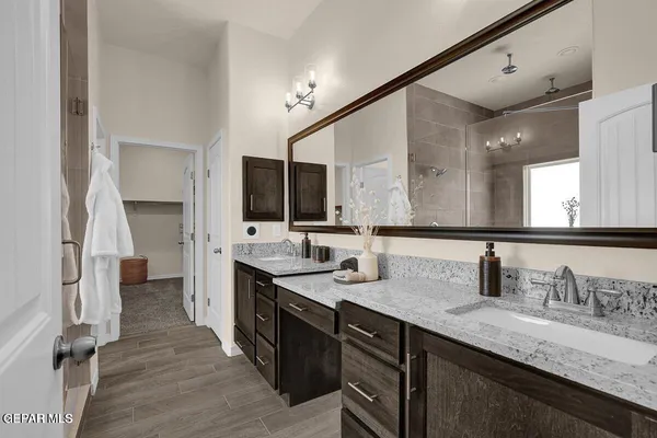 a bathroom with a bathtub and shower