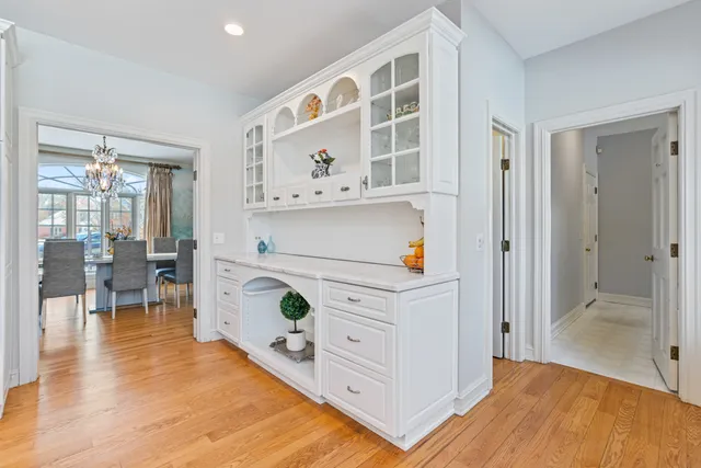 a view of kitchen and dining room with wooden floor