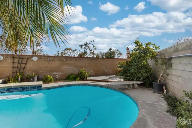 a view of a chairs and table in the patio