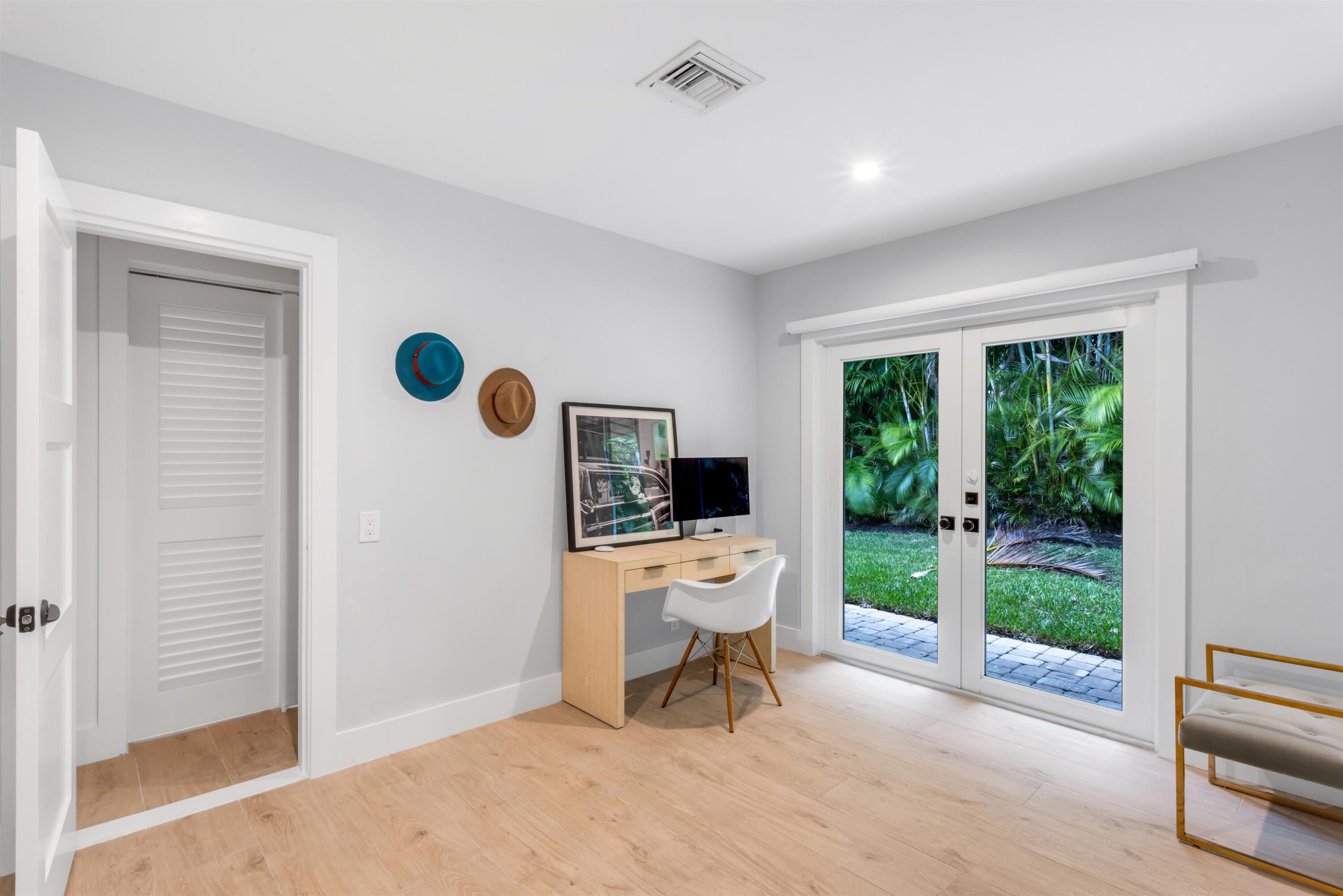2720 Cardinal Circle Gulf Stream, FL 33483 - Photo 17 of 28 a work room with furniture and a window