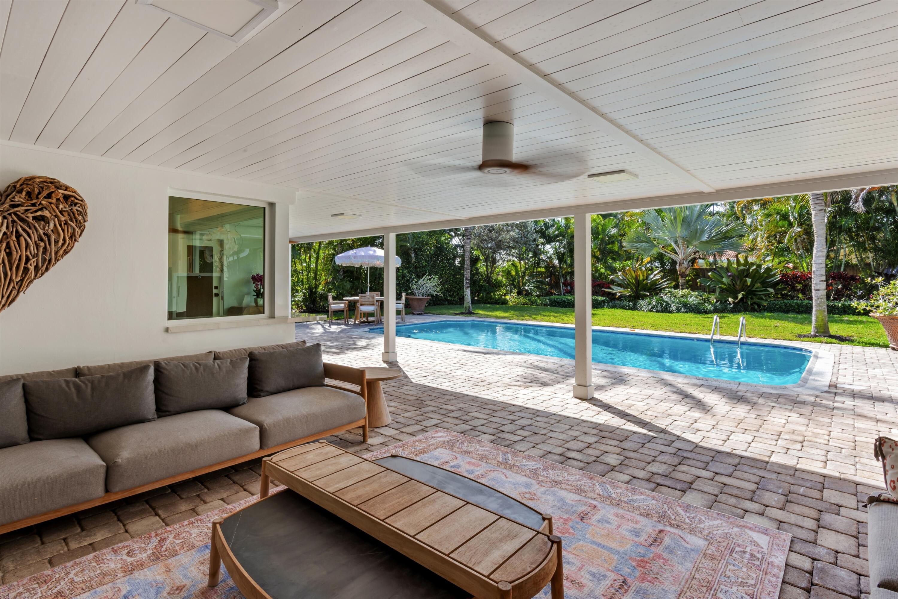 2720 Cardinal Circle Gulf Stream, FL 33483 - Photo 22 of 28 a view of a patio with a backyard