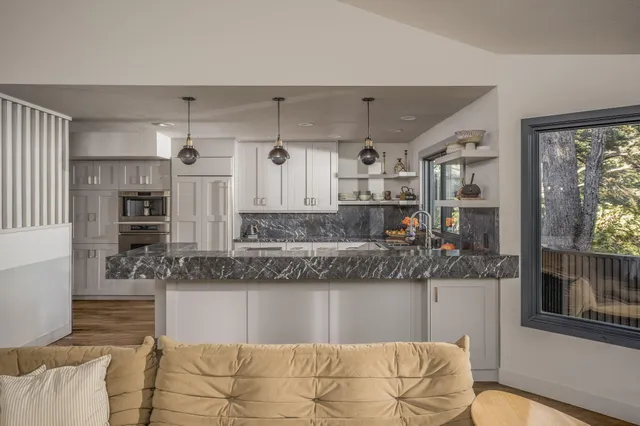 a view of balcony with furniture