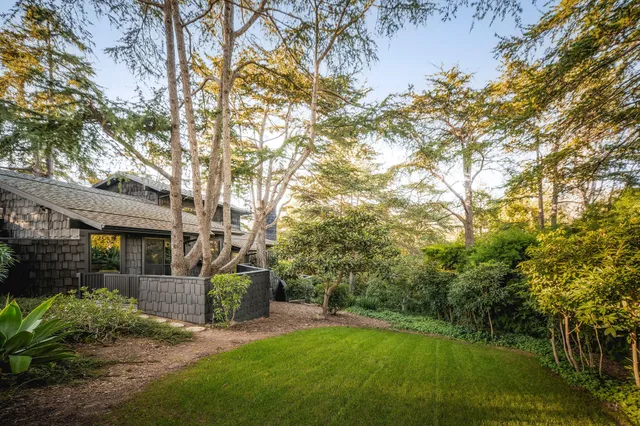 an aerial view of residential building with parking space